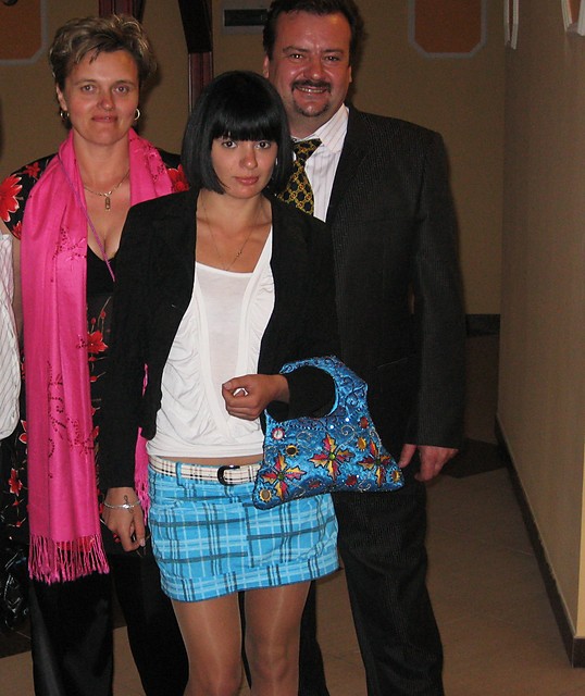 With parents..