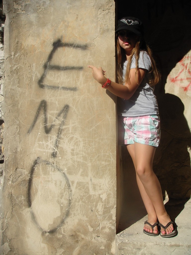 Em