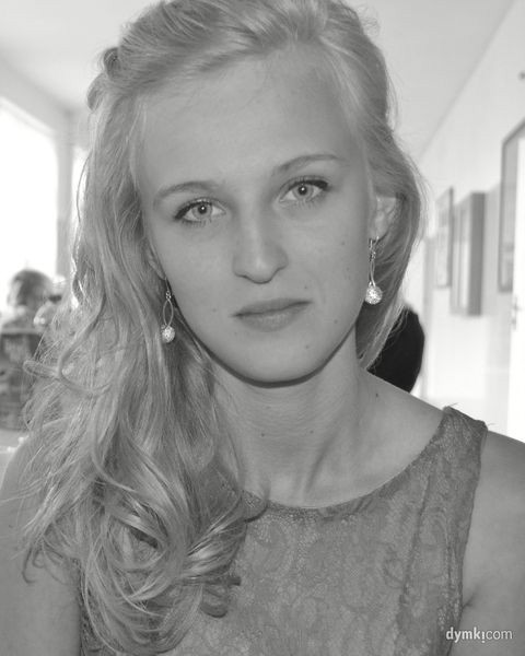komers.