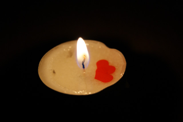L.