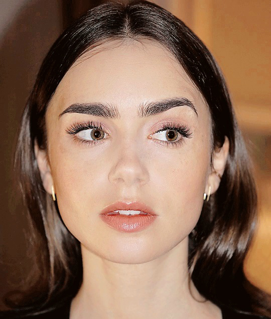 Lily Collins,.