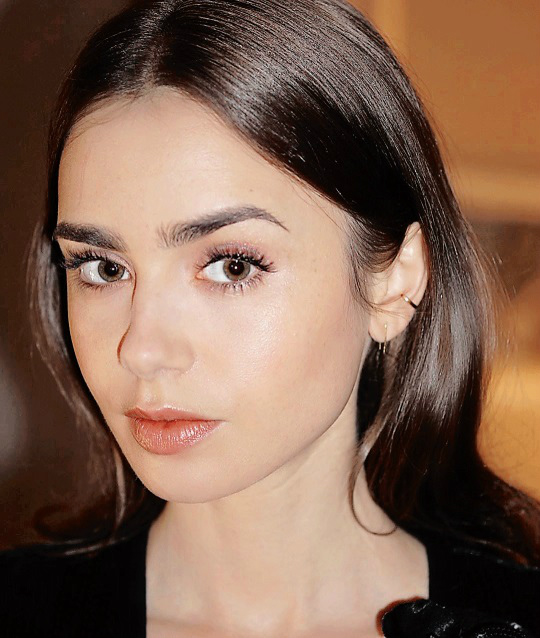 Lily Collins,.