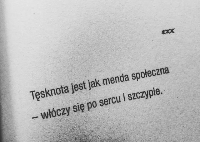 T.