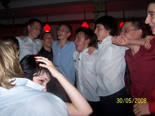 komers