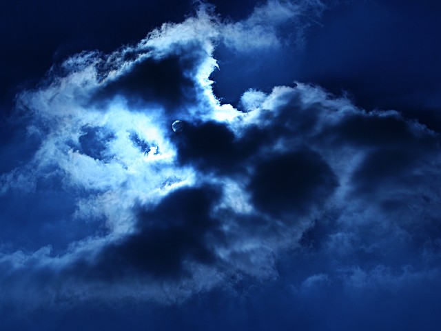 With hands held high into a sky