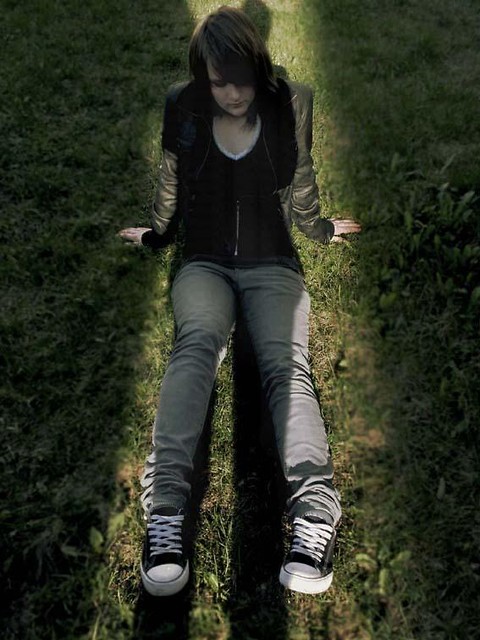 Girl in the shadow of the sun