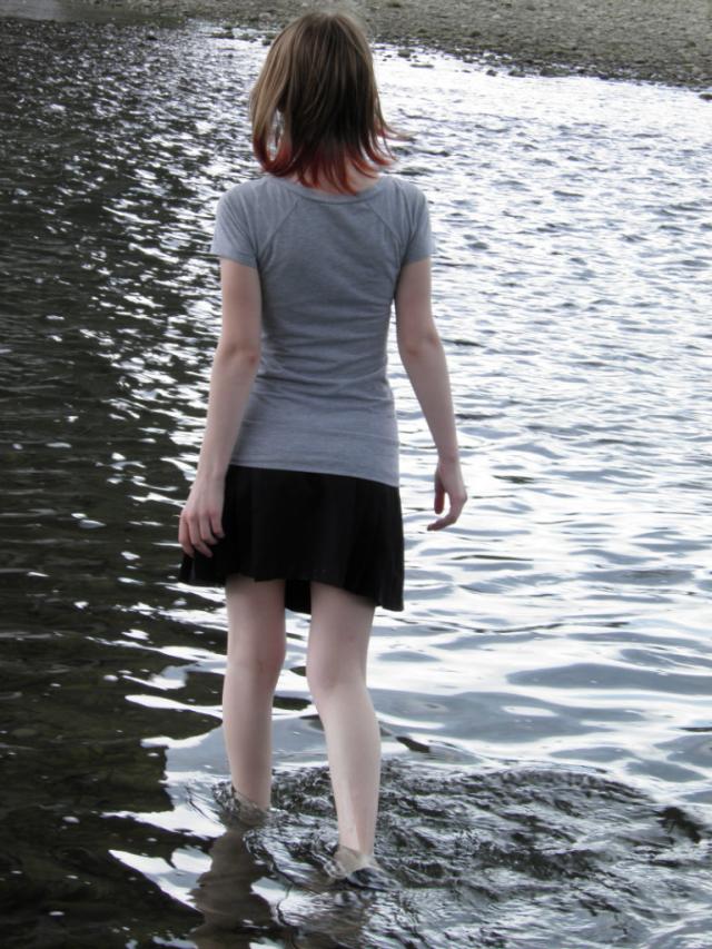 Staring at the water.