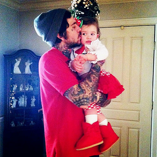 tatttooed man & baby