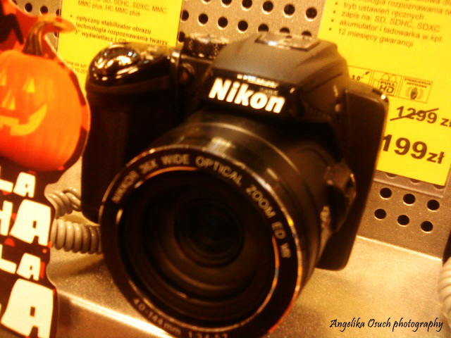 Nikon;*