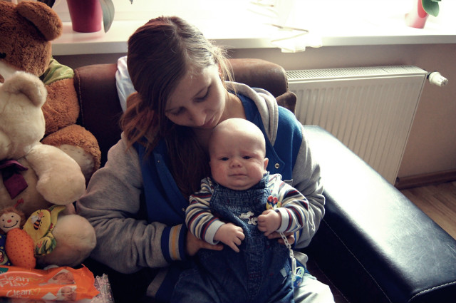 with brother. 