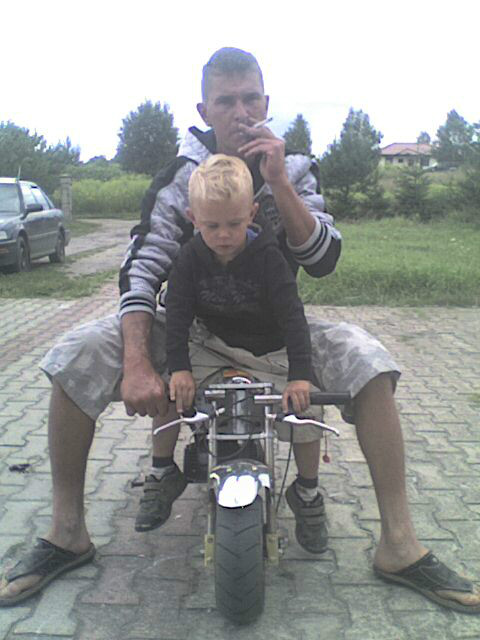 Nikolasek z tatuciem