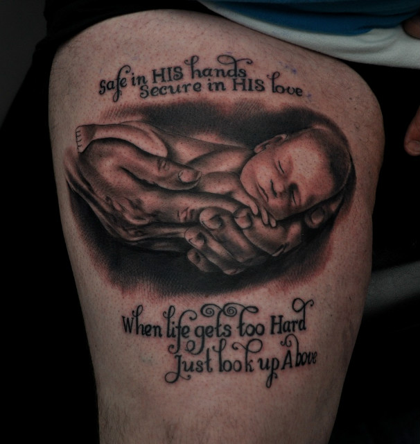 baby on hands tattoo