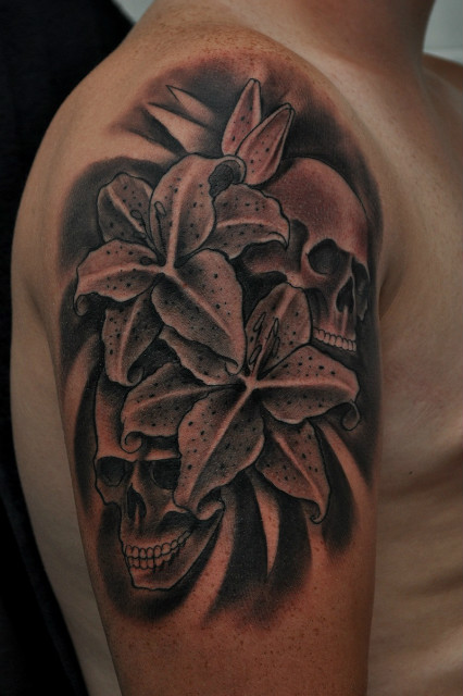 skull tattoo , orchids tattoo