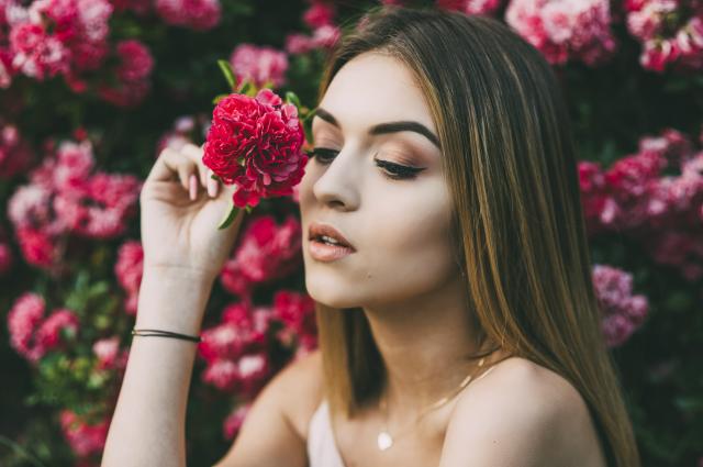 Woman in the roses.